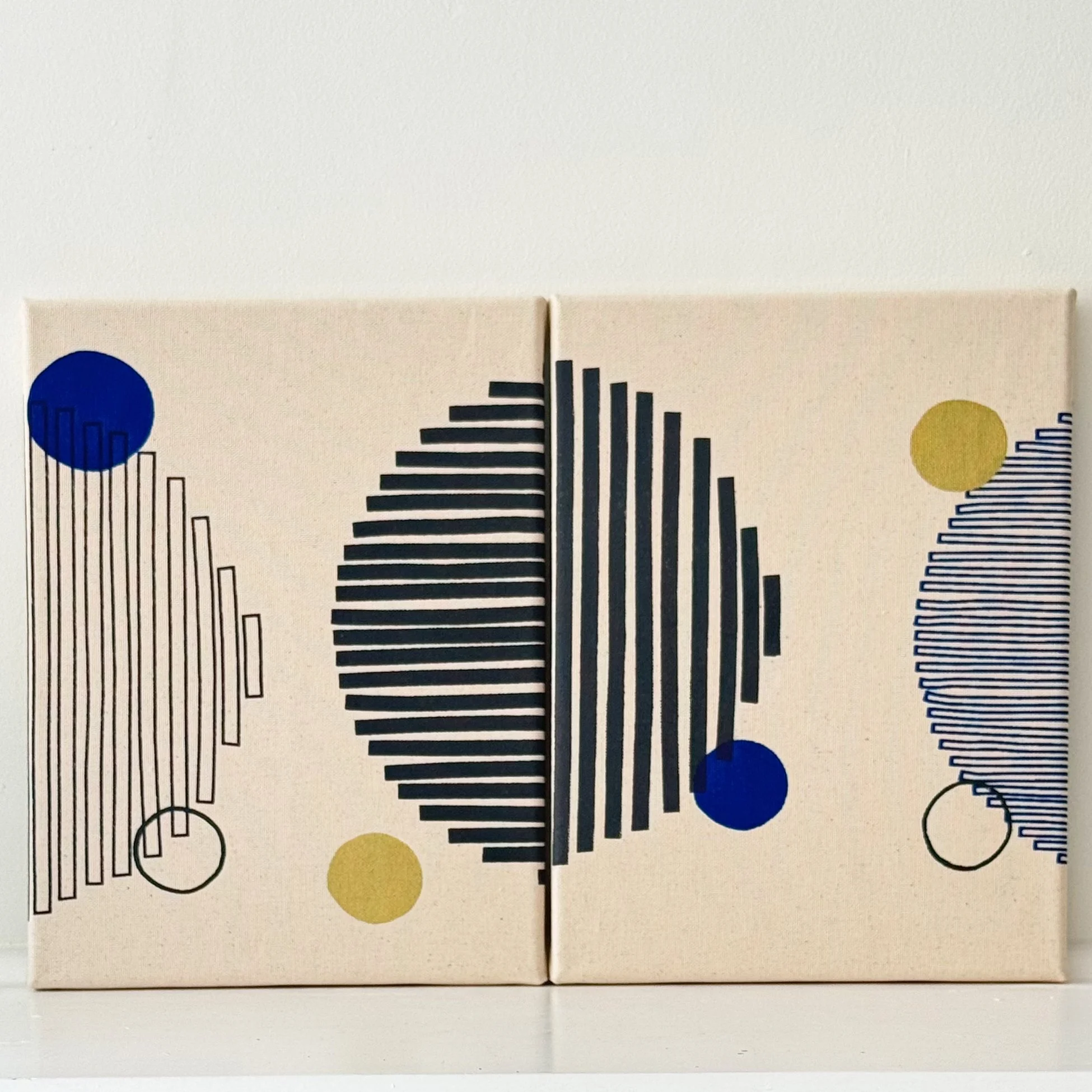 9x12_cosmo circles both w:blue and gold.jpg