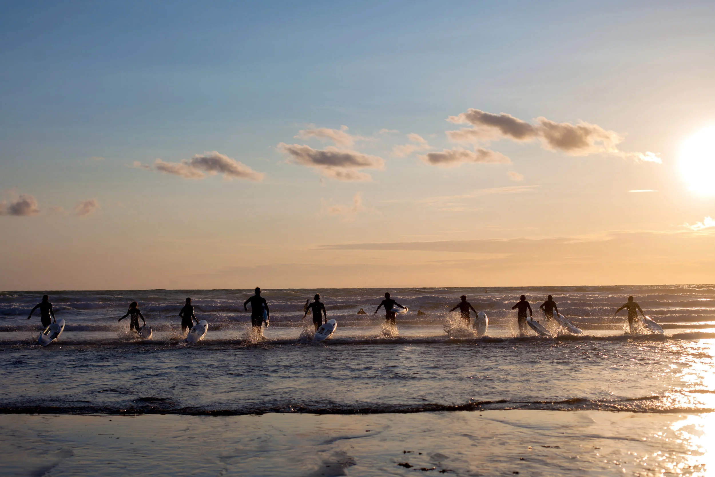 GroupYoungSurfers-shutterstock_214330615.jpg