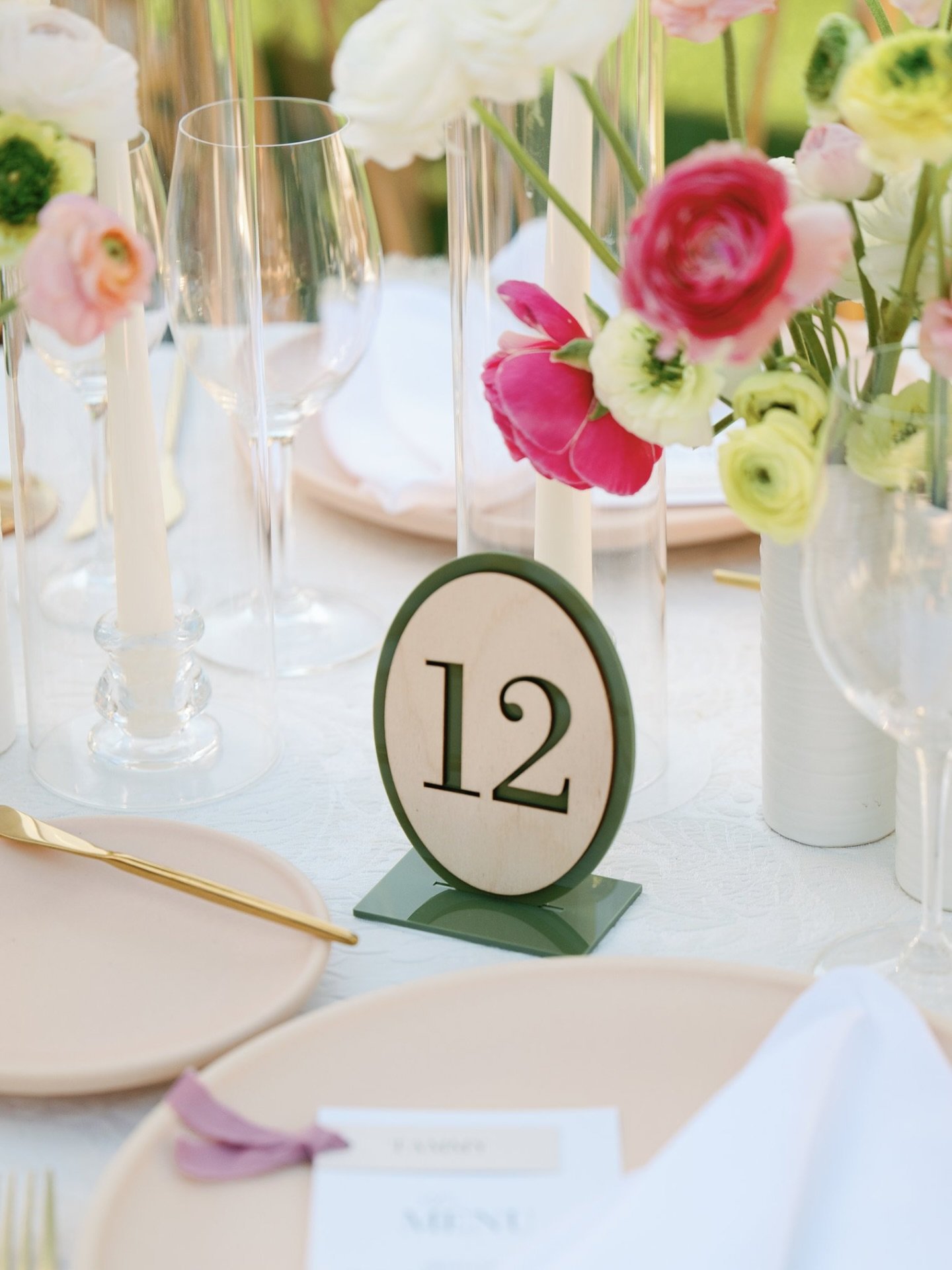 Love combining different materials together like this wood and acrylic table number design.