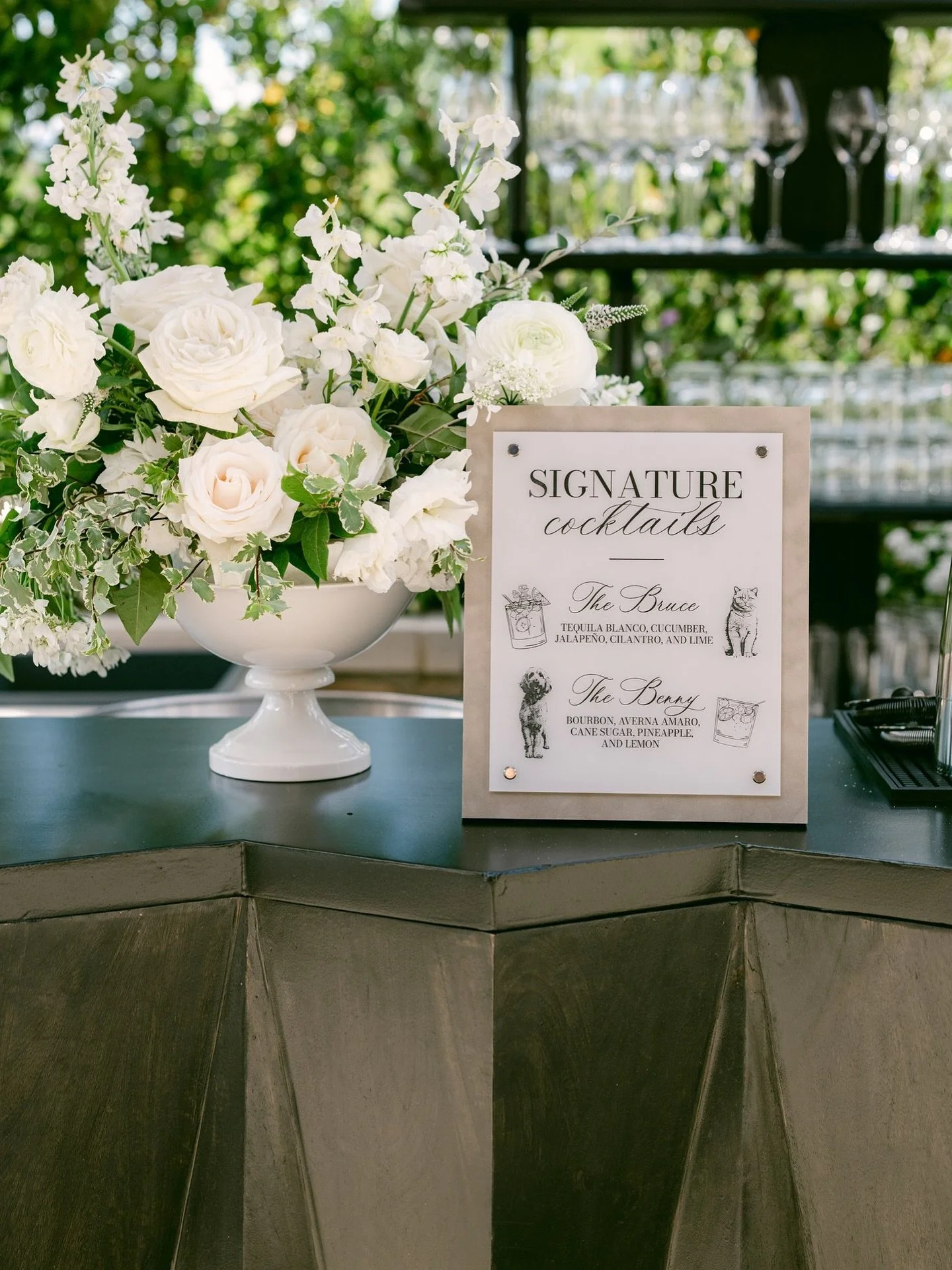 Creating unique bar signage that is cohesive with the rest of the event design is a detail I prefer to not skip! Velvet backed acrylic, engraved with photos of the couple&rsquo;s pets. 

Photo: @scottanddanaphotographers 
Full Planning and Design: @a
