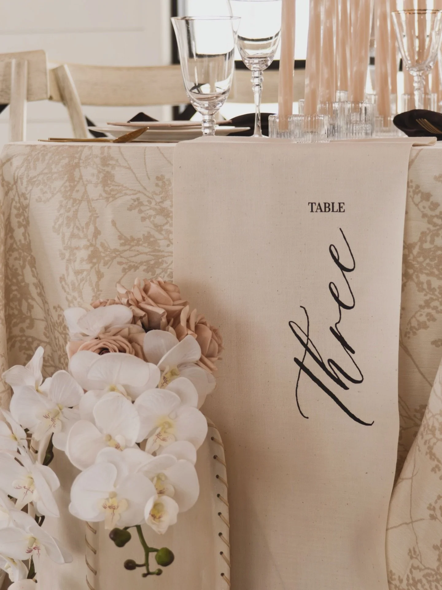 Soft textures, warm neutrals, and a touch of modern calligraphy. A table number designed to blend beautifully into the tablescape while still making a statement. 

Venue: @_themargaux 
Florist: @petals.n.palettes_ 
Rentals: @thelinenshoppetls @cteven