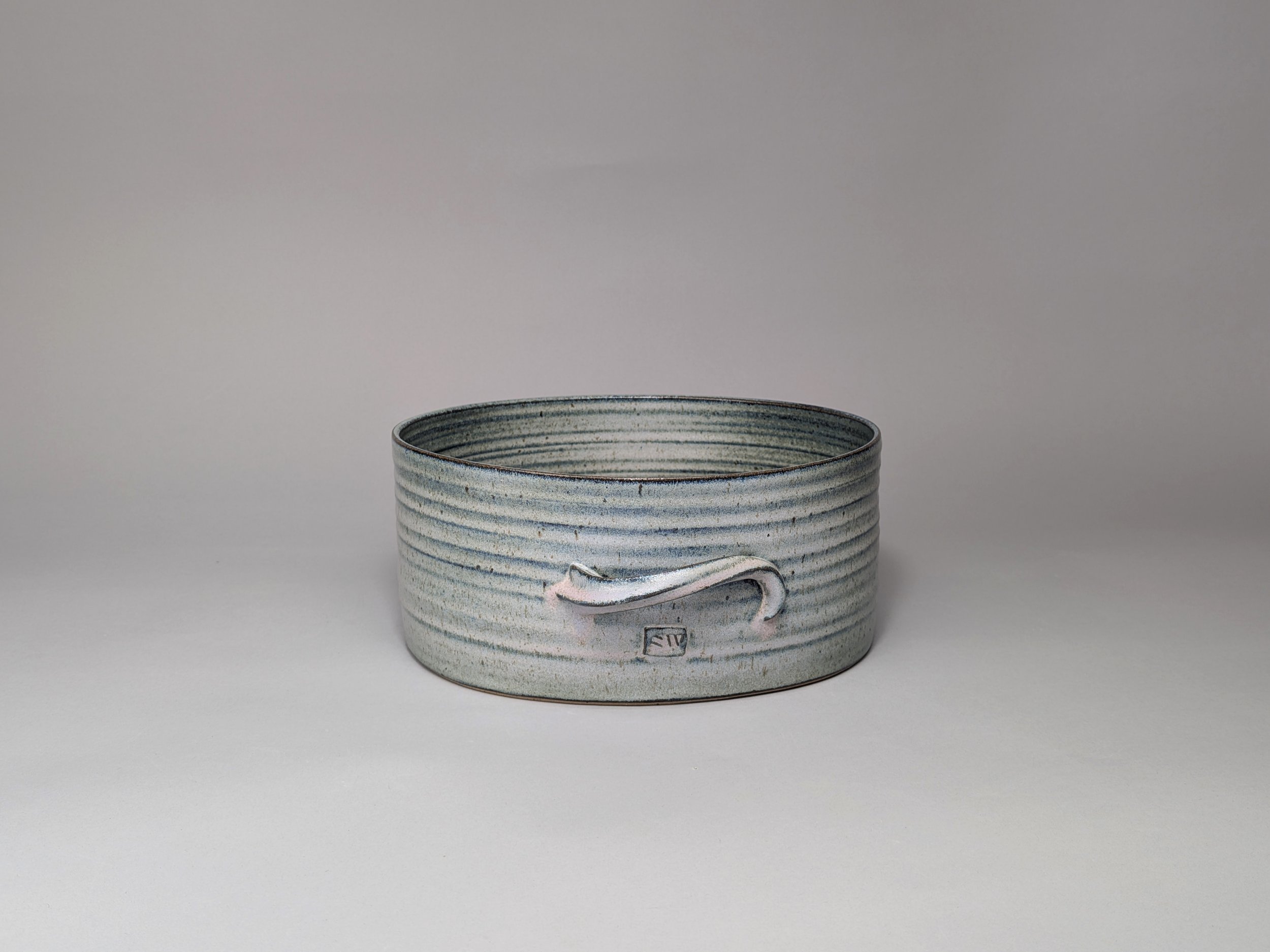 Large broken blue oval baking dish £85