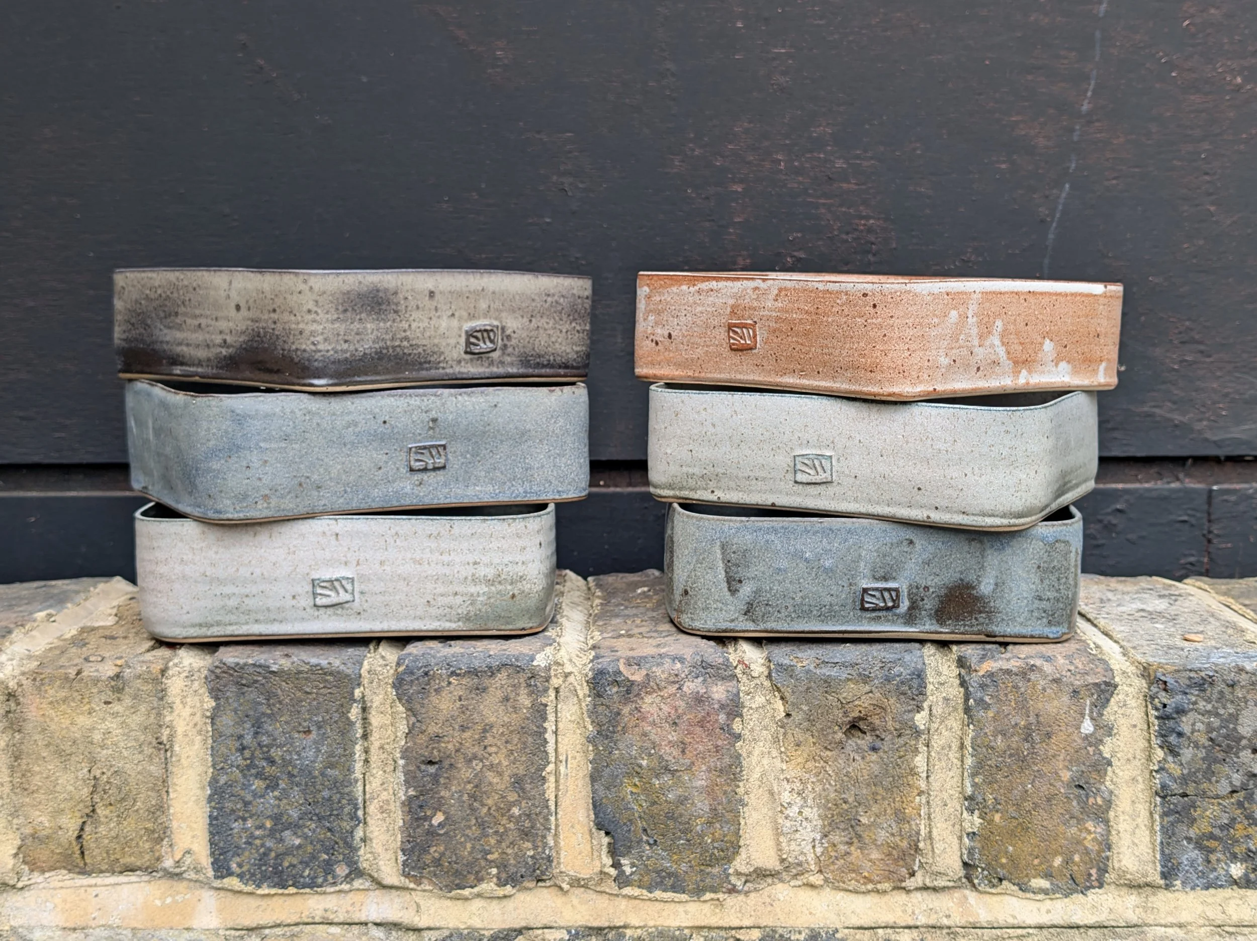 Baking dish stack on wall.jpg