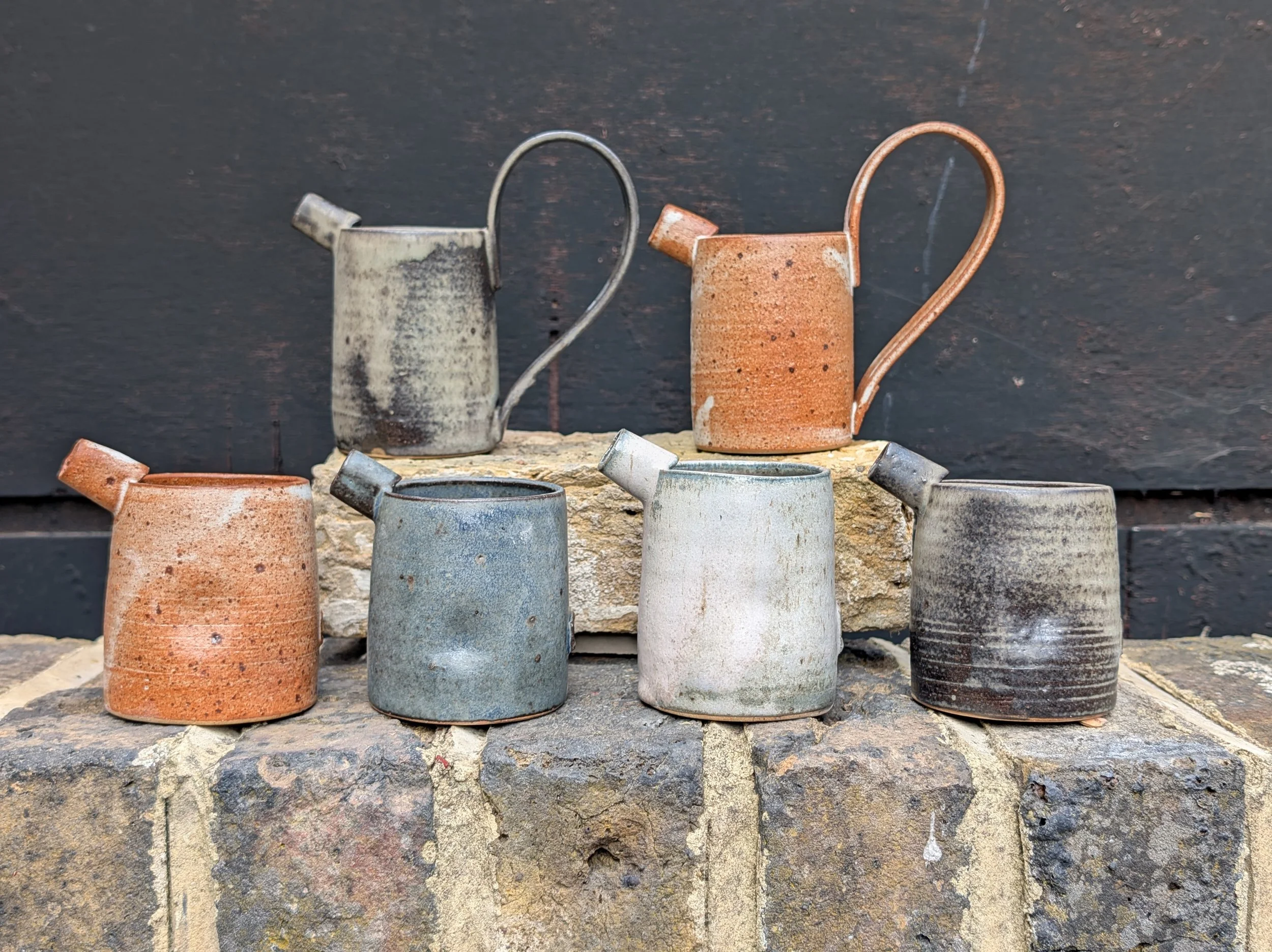 Jugs on wall.jpg