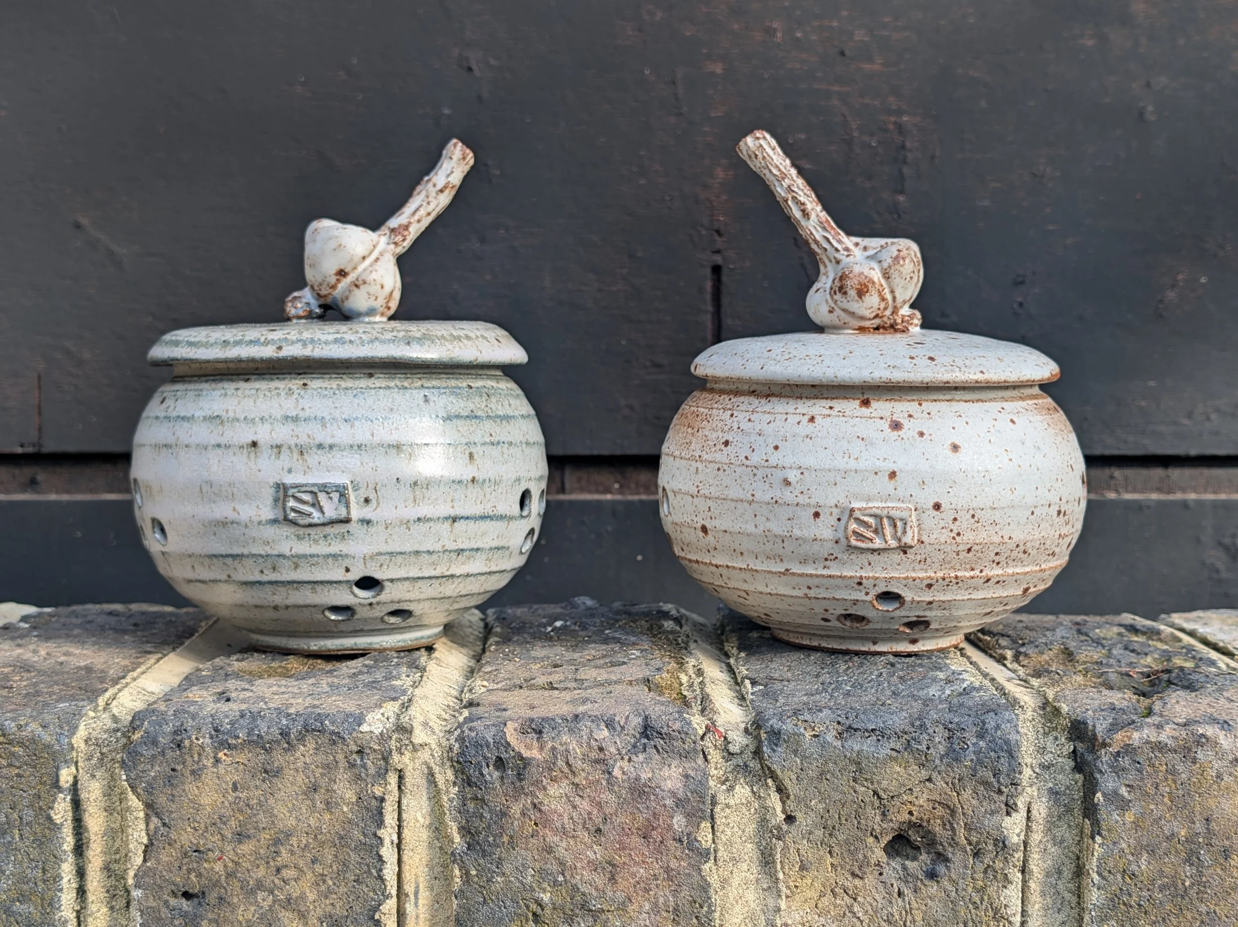 Garlic pots on wall.jpg