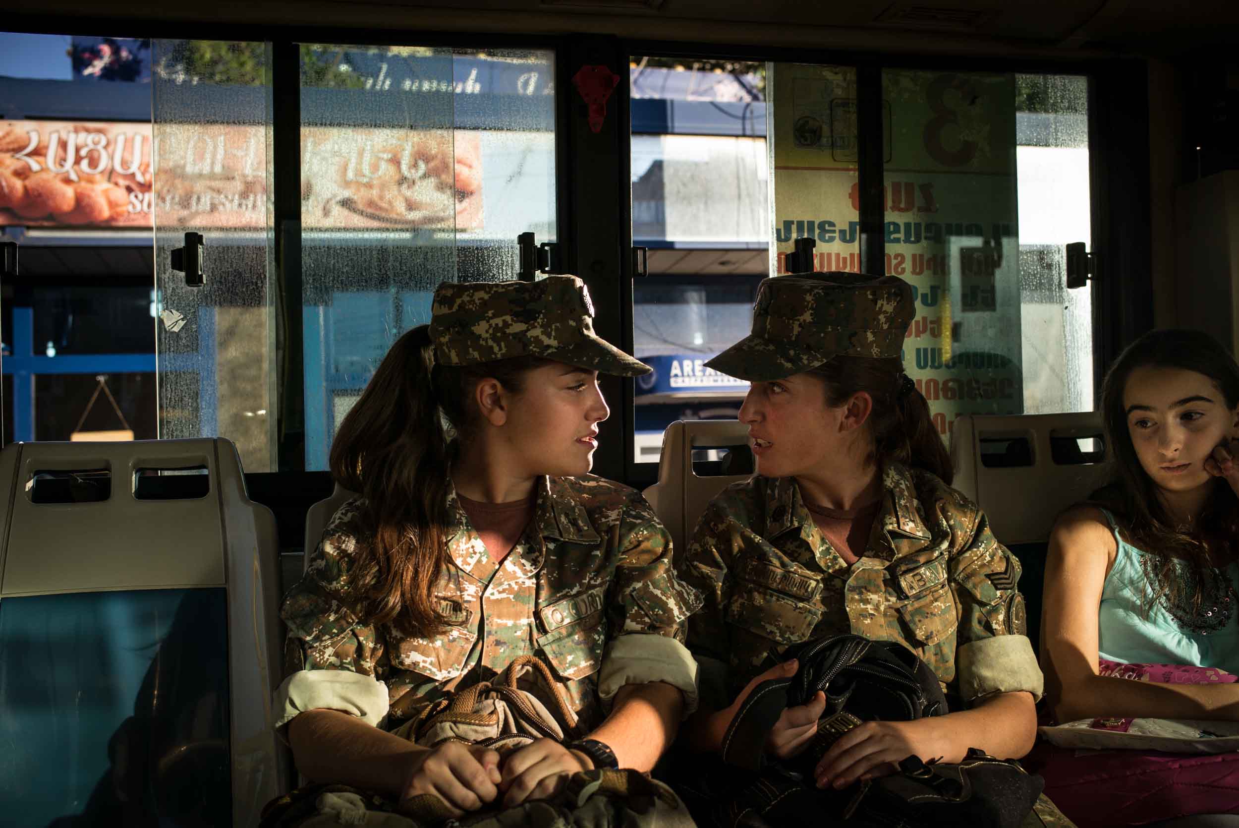  Girls on their way home to their dormitory at the Military High School in Yerevan. "I notice that still many people talk about us, but I don´t care", says one of the students. 