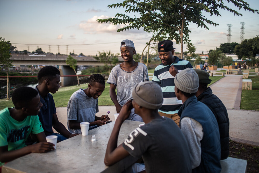  Katlego and his friend William, both members of the EFF, are meeting friends in a public park in Alexandra, one of the biggest townships in Johannesburg, South Africa. 