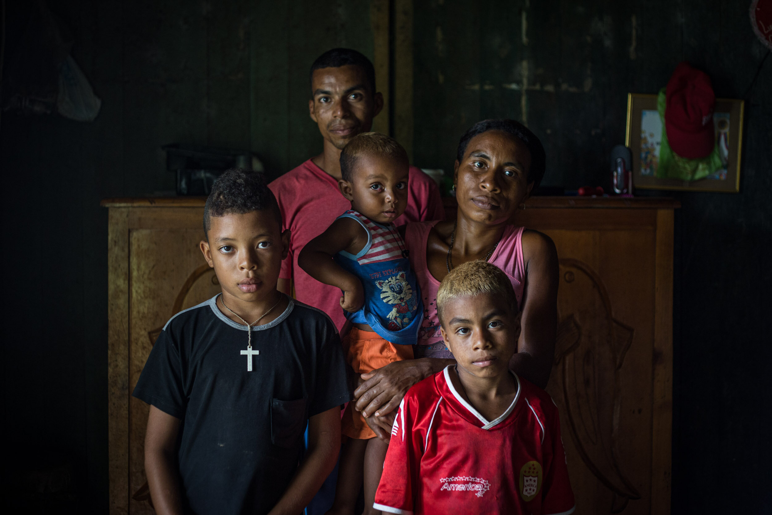  Nano, 31, with his wife and 3 children. Nano has been working in the coca process since he is a child. He started cultivating coca 9 years ago. "I don´t want my children to depend on the coca as I do. But for now the coca allows me to send them to s