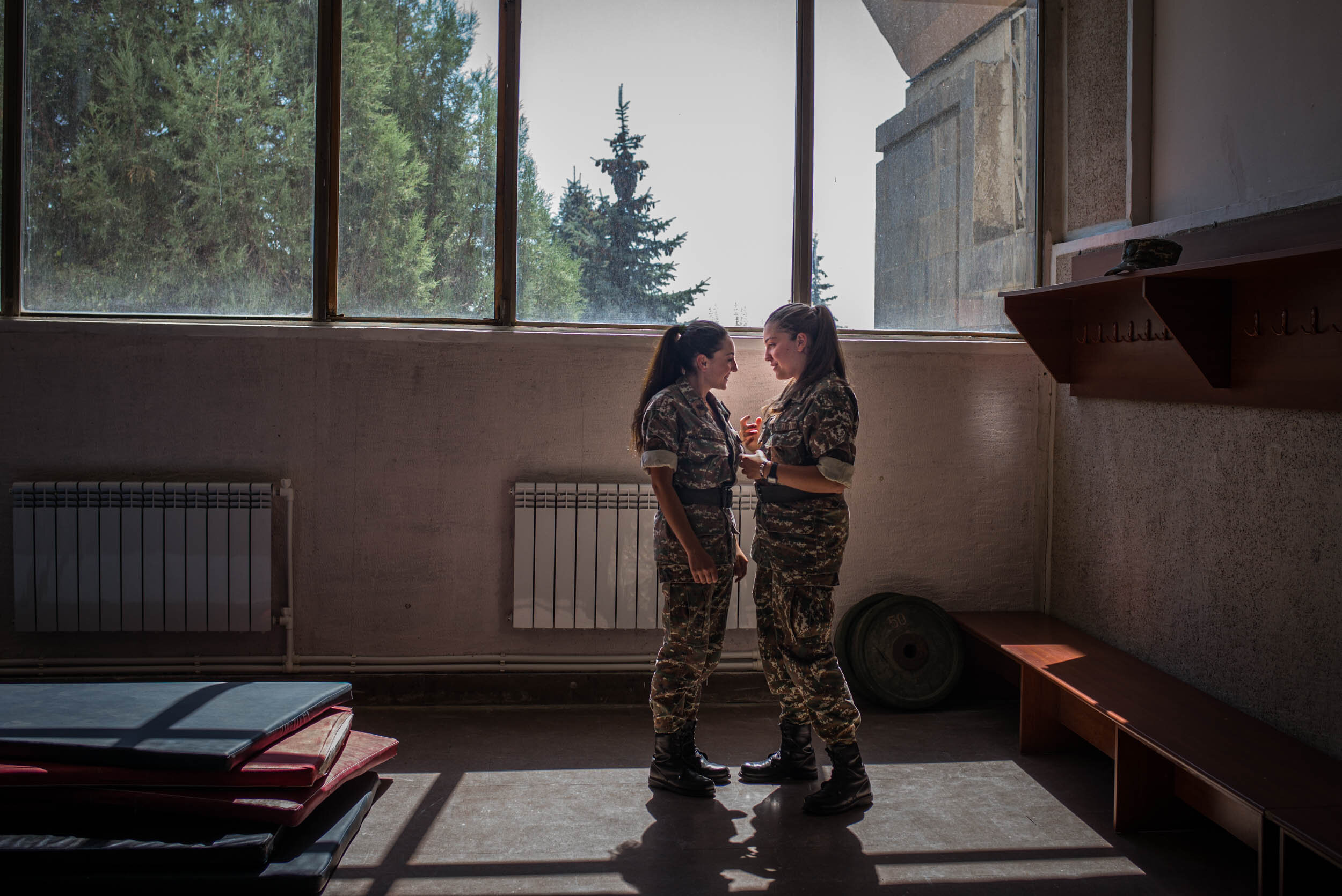  Two girls chatting during free time, Yerevan Military University. 