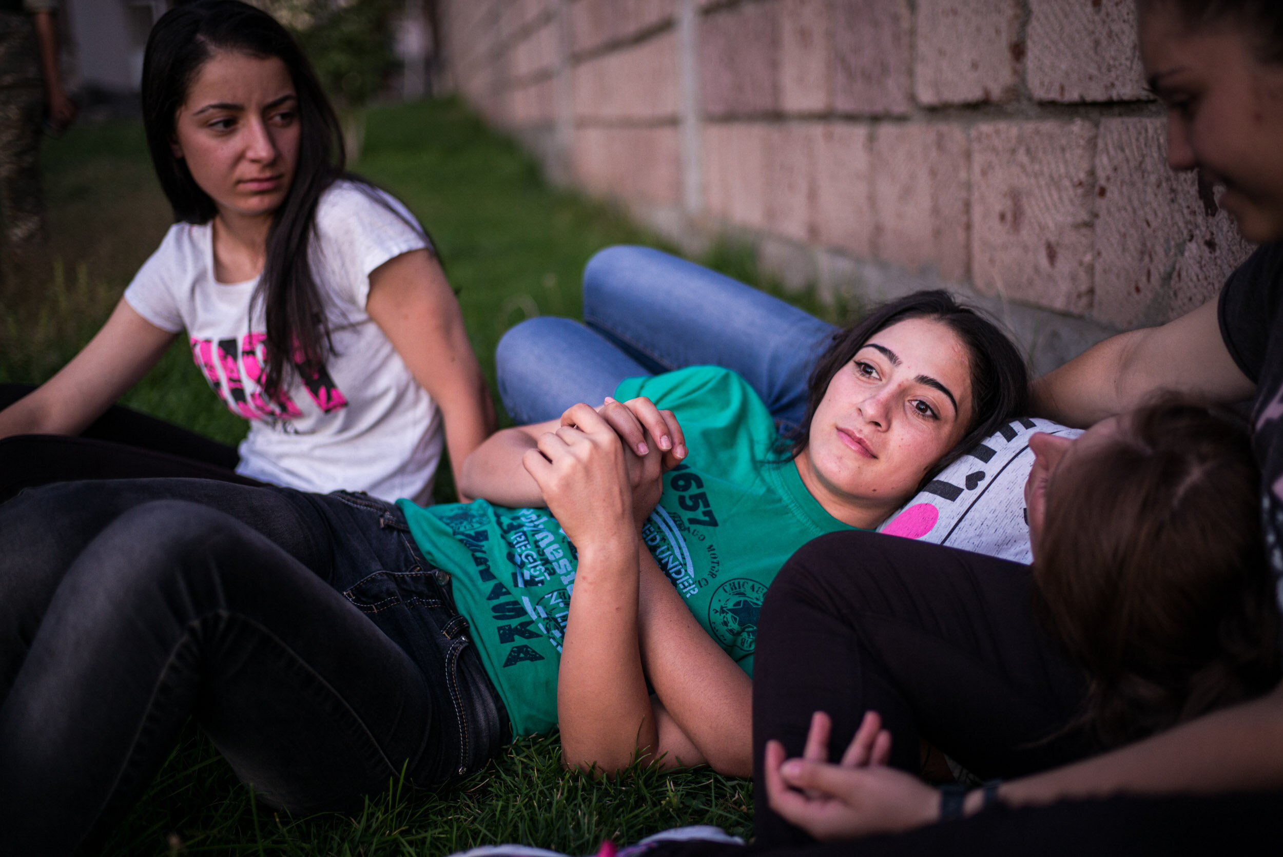  Mariam and her friends spend time together after clases in the backyard of their dormitories in Yerevan. Despite the fact that many of the young women had family members who served in the military, there is still much resistance to their new role. “