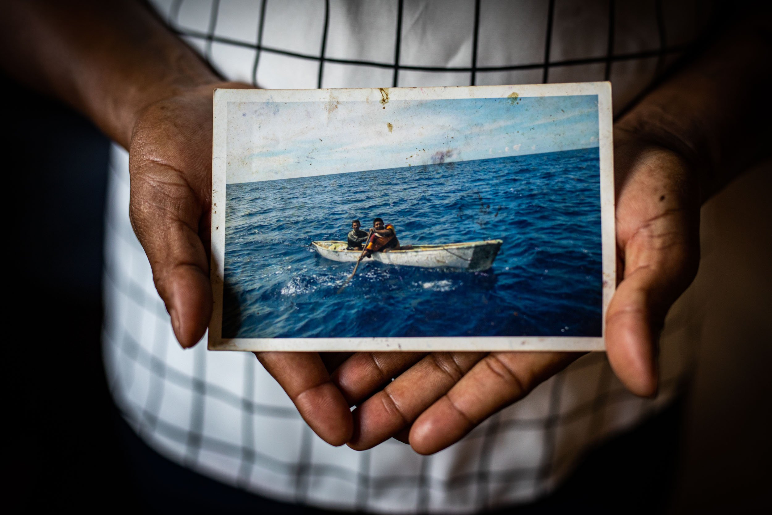  Tania Santos Zelaya, 36, holds a photo of her husband Electerio Santos Zelaya who died due to decompression sickness in December 2018. 