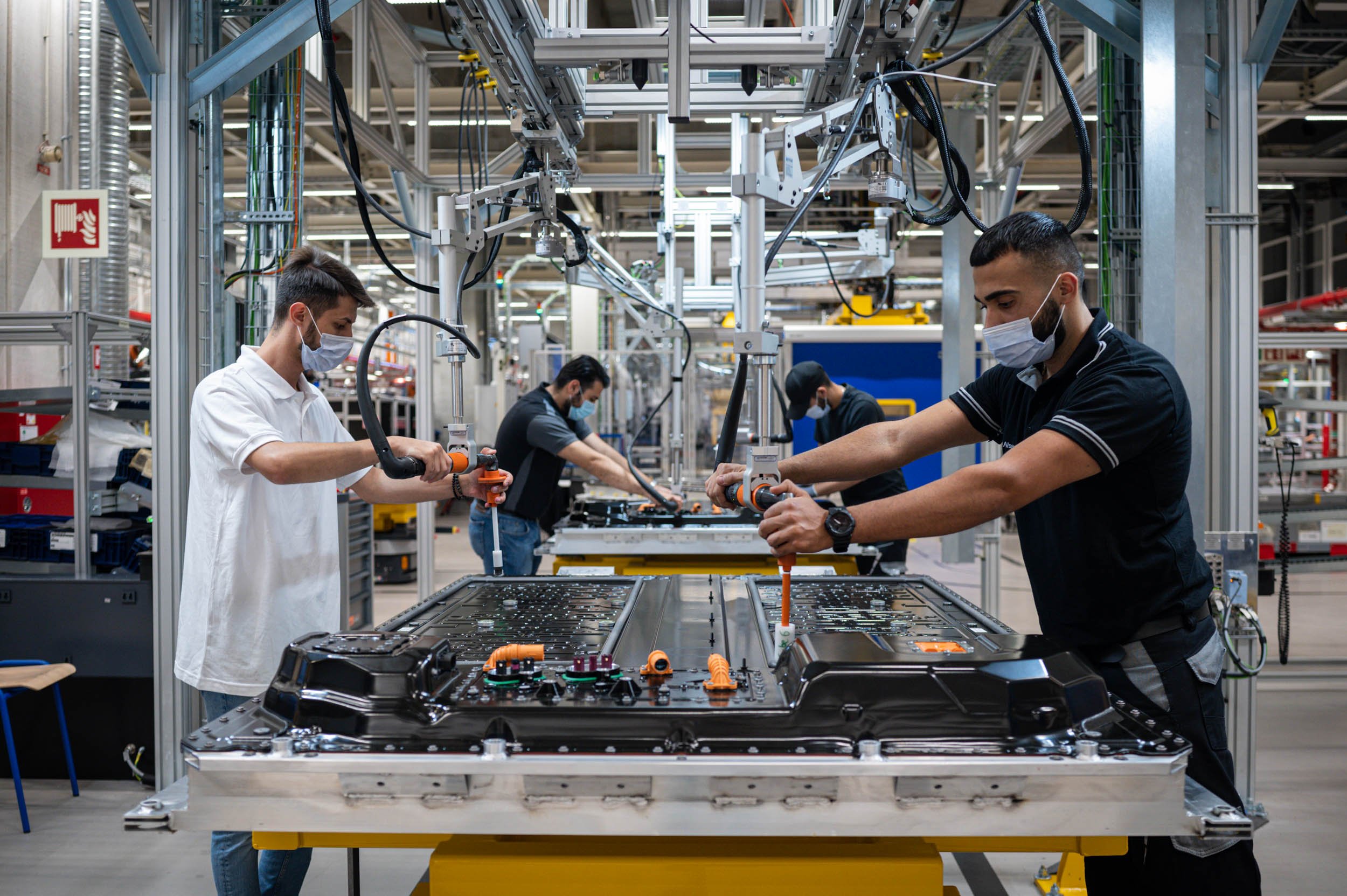  Workers assembling batteries for Mercedes electric cars in Stuttgart. 