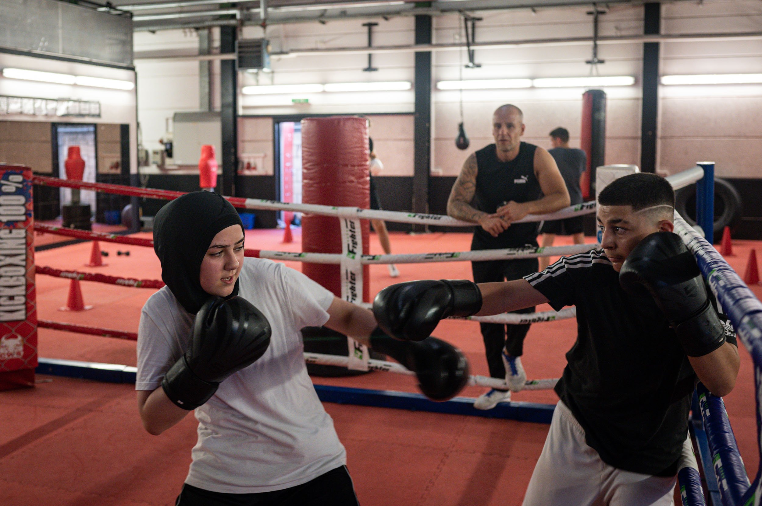  Romaissa Elbaghdadi, 15, training with Angelo Raimon, 13, at a boxing club in Offenbach. 