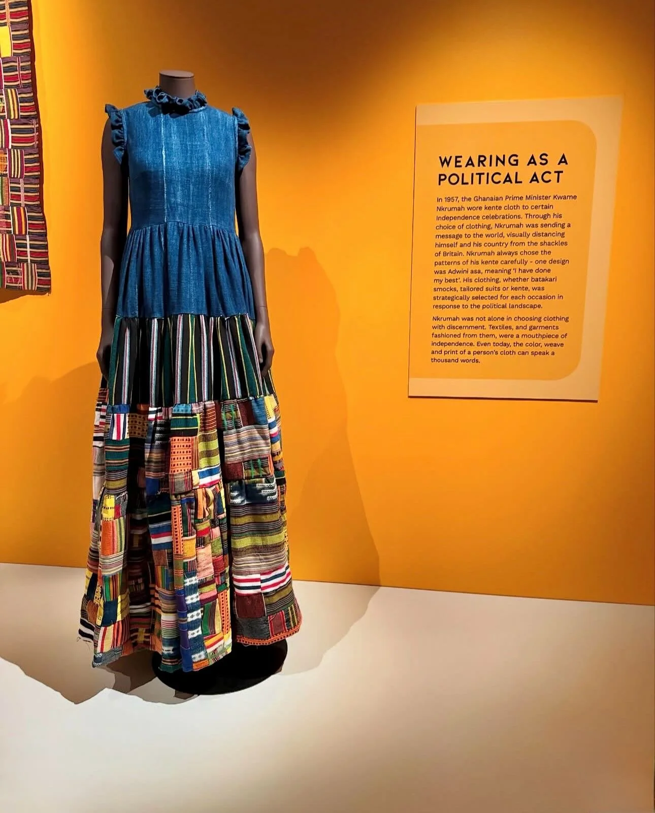 The hands involved in the weaving, printing, dyeing, cutting, patch-working, and draping of this Indigo Kente Woven Patchwork Sleeveless Ruffle Dress featured in the Africa Fashion exhibition are based in Accra, Ghana and work with Studio 189. 
If yo