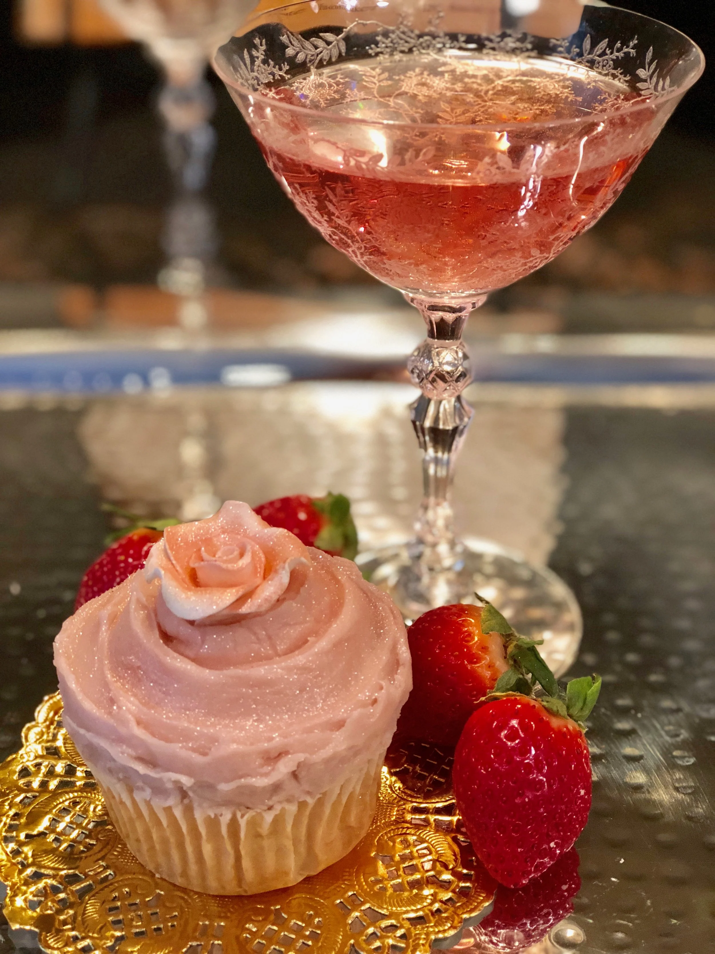champagne cupcake and coupe of champagne .jpg