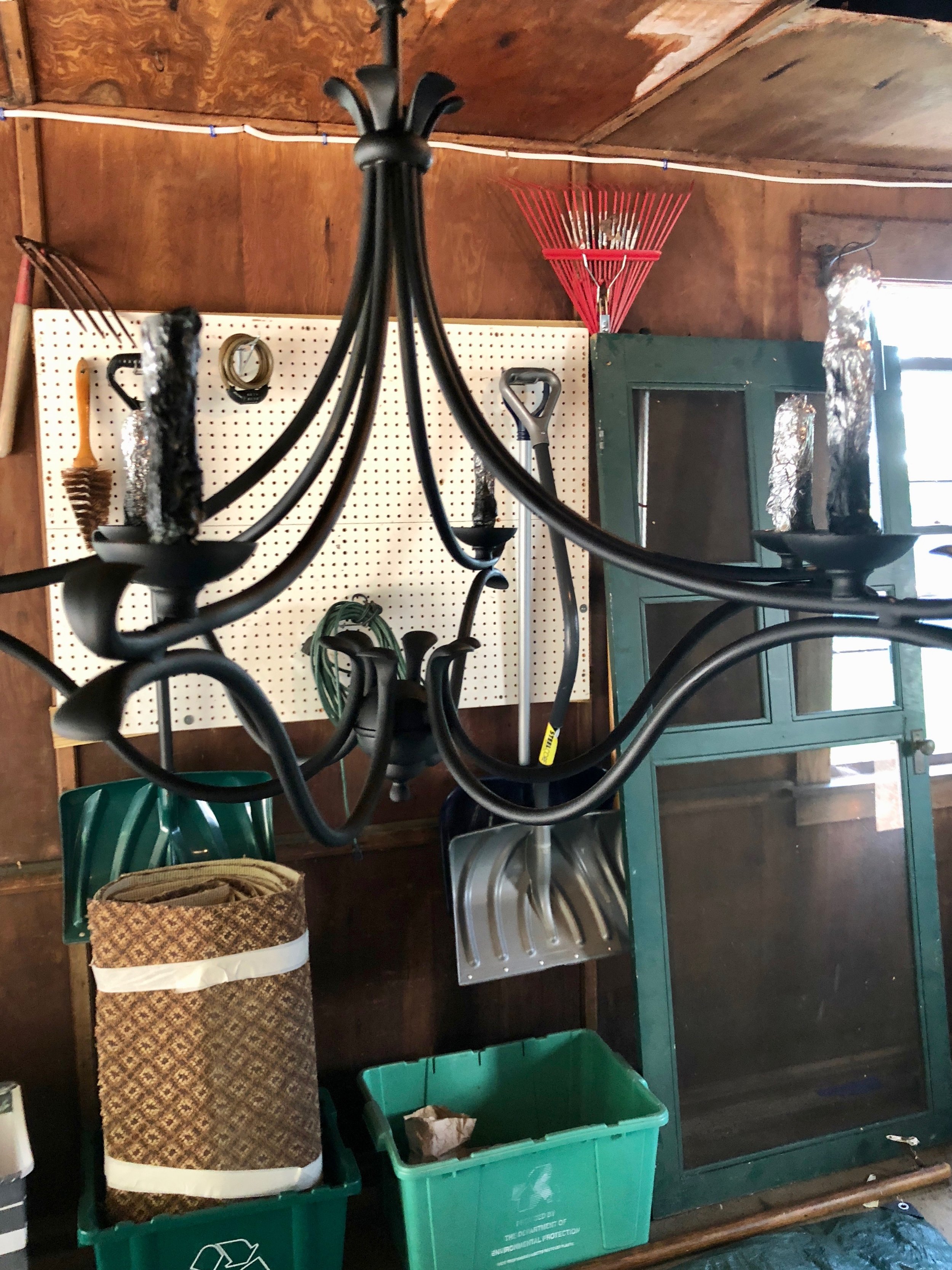 Black primer on brass chandelier