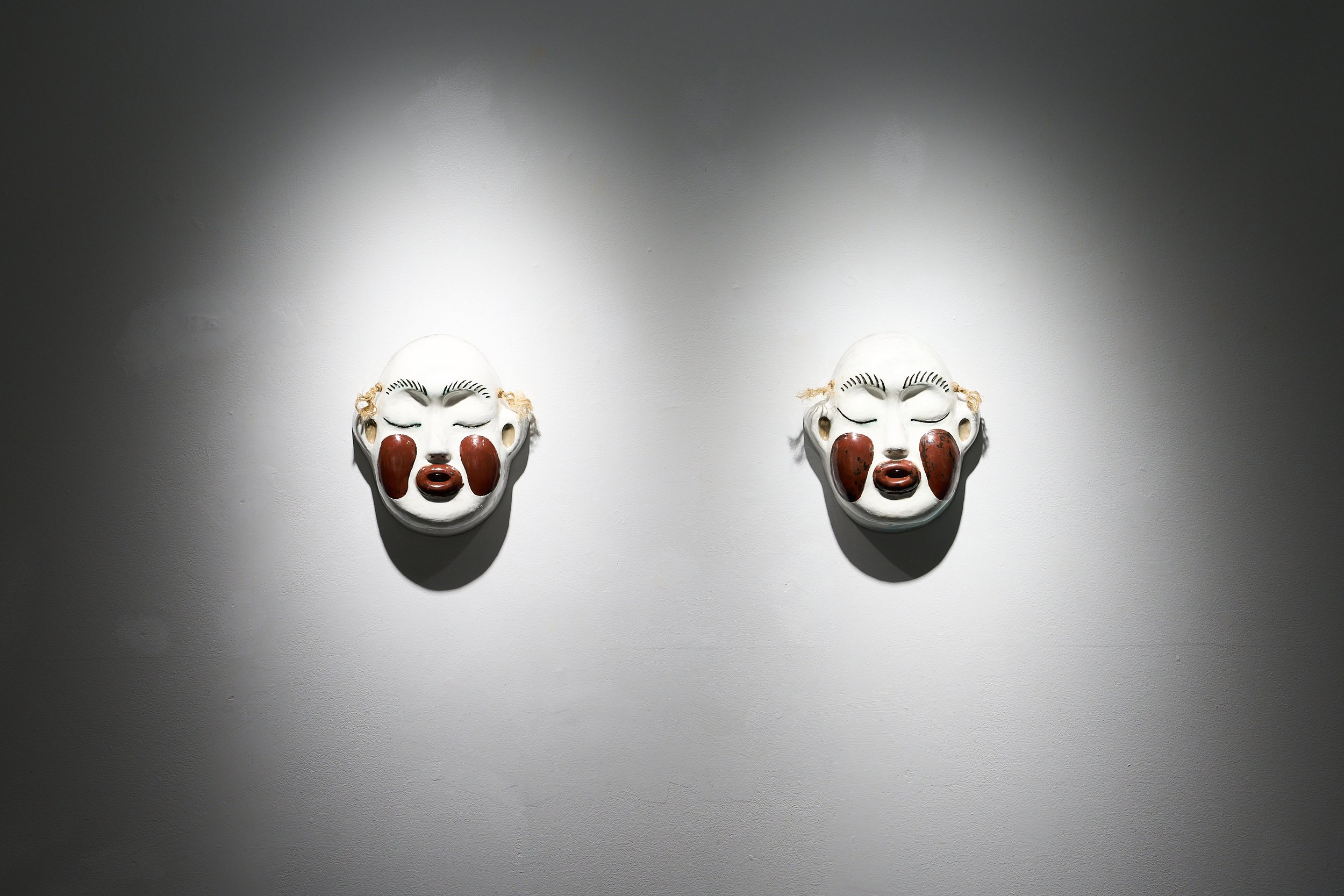 Idiot Masks #3 &amp; #6, 2022, ceramic and rope, 25 x 30 x 10 cm.