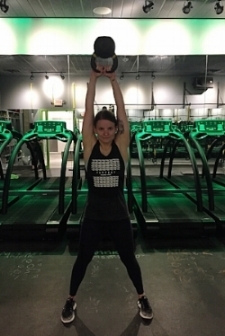 This is the face I make when I feel like a badass for swinging heavy stuff over my noggin with good form. 