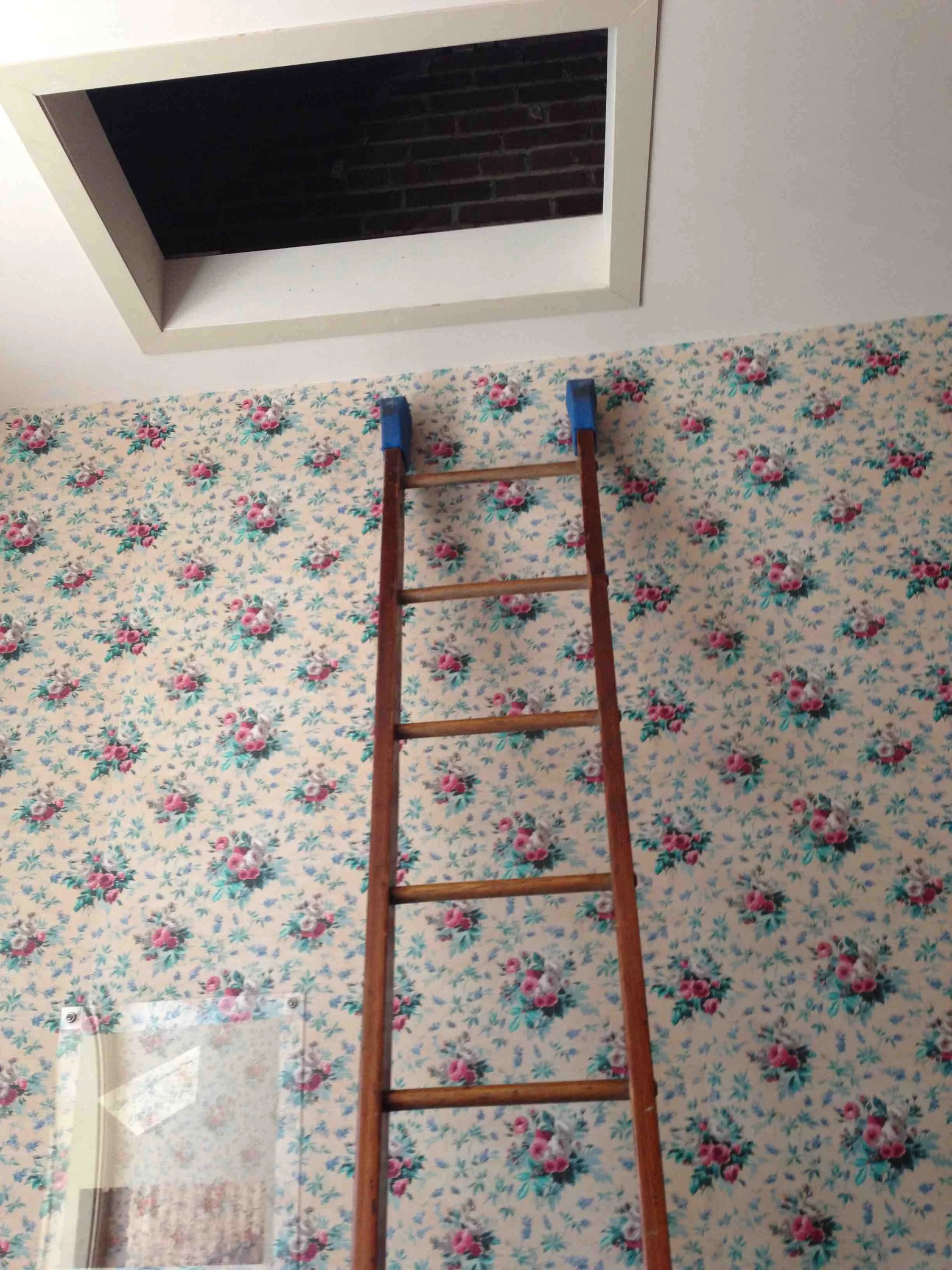 It was up here that Lyons found Clara Barton's belongings. The patch shows the original wallpaper, which was reproduced throughout the room as a digital facsimile.