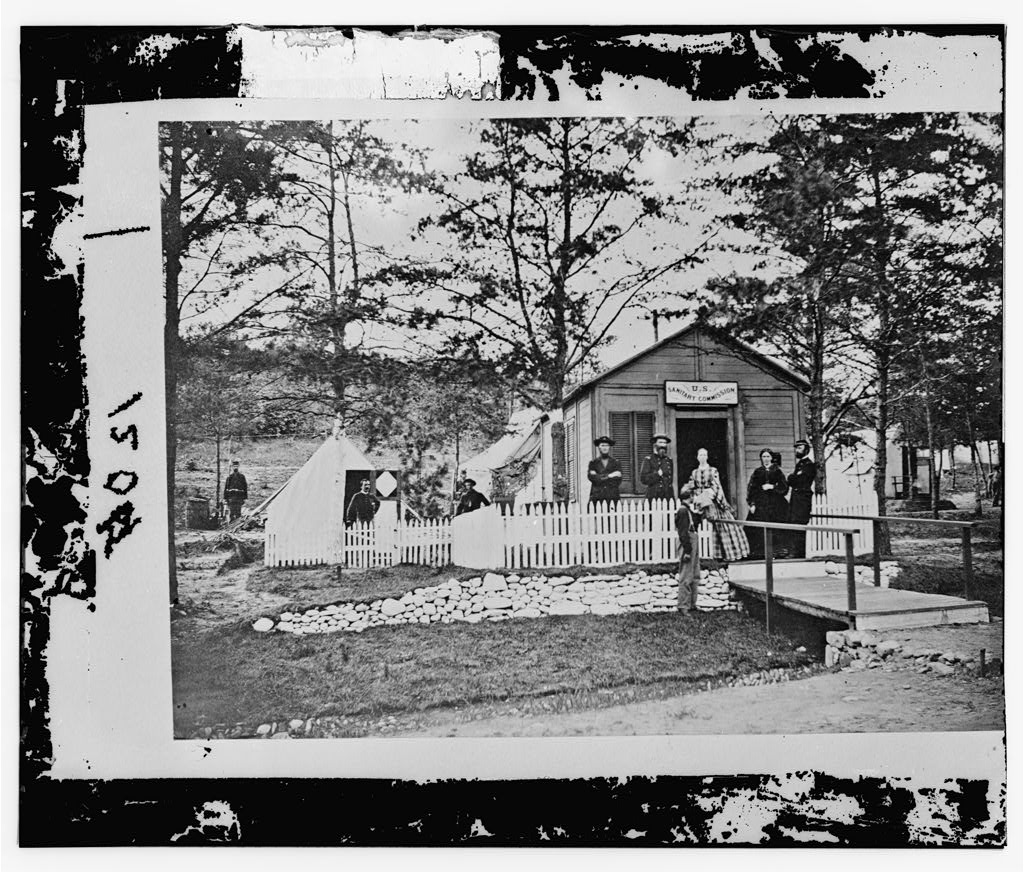 The people are not identified, but the woman in the checked dress does seem to have the face shape of Amy Bradley. From Library of Congress.