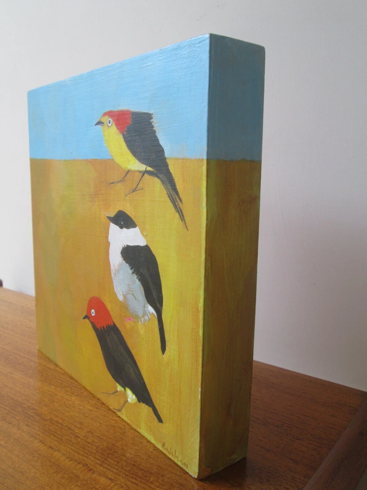 Three Manakins edge.JPG