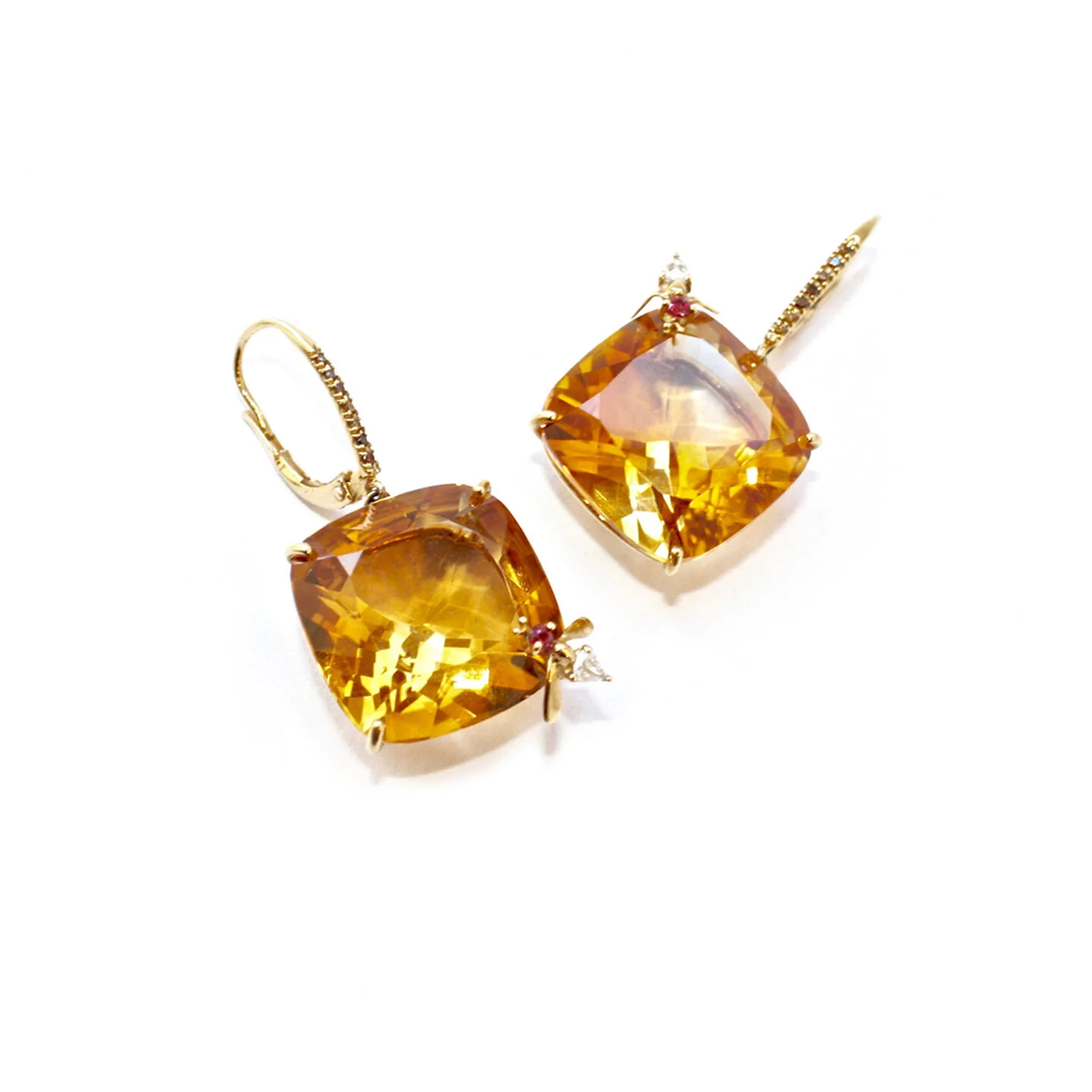  Citrine and Orange Sapphire Bee Earrings  $9,600.00     A pair of cushion shaped citrine earrings, suspended from a diamond set french wire.  A bumblebee, set with a round facetted orange sapphire and a pear shaped rose-cut white diamond, has been w