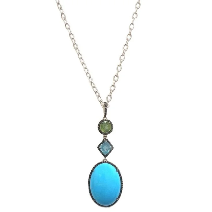  Lavale Necklace   $13,200.00      An eighteen-inch blackened platinum chain suspending a long pendant, composed of three primary motifs.  Falling from a black-diamond encrusted bail is the first motif, a round facetted green tourmaline.  Next in lin