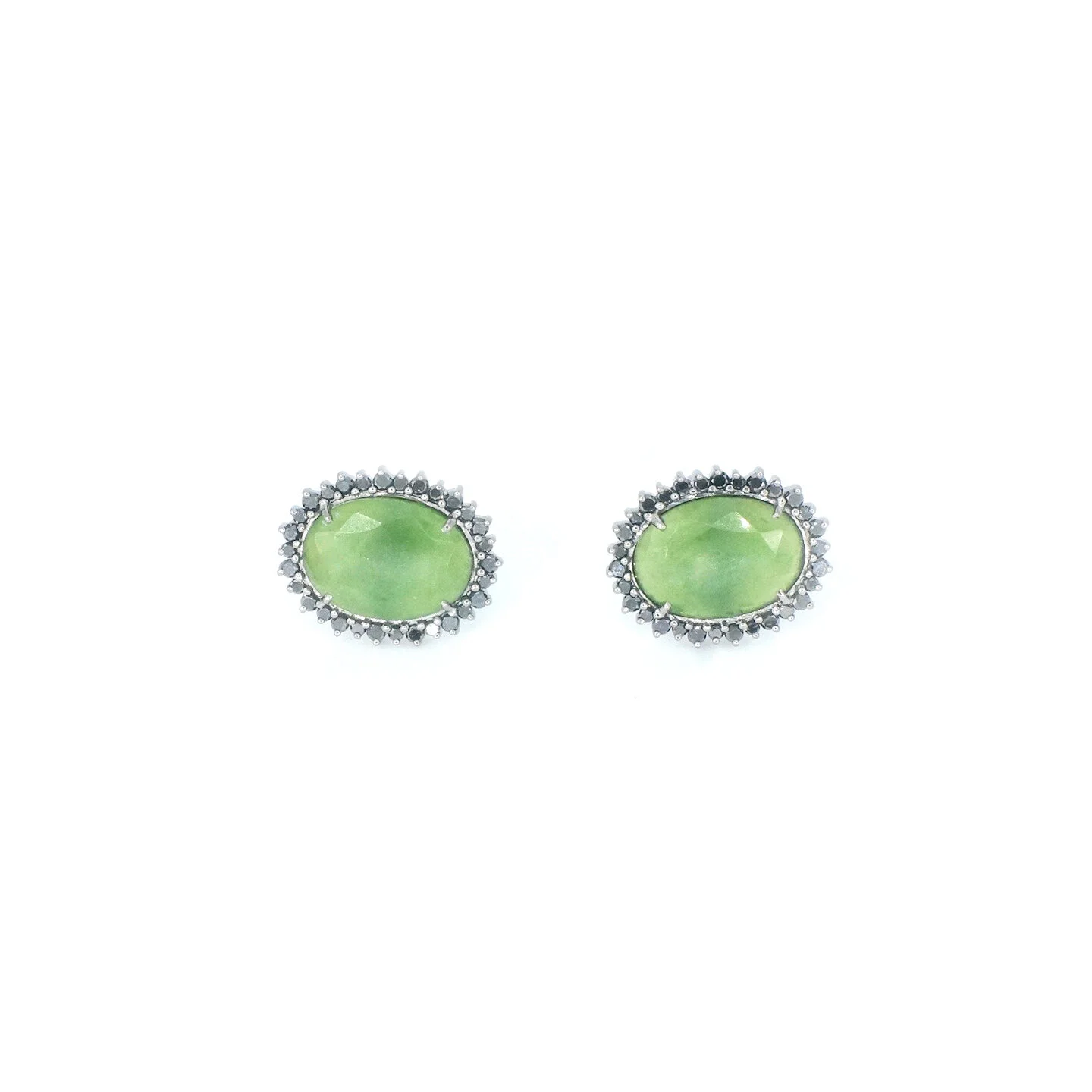  Jade Martha Studs   $7,700.00     A pair of eighteen-karat blackened white gold earrings consisting of an oval faceted green jade surrounded by black diamonds.       This piece is one-of-a-kind and entirely handcrafted.  