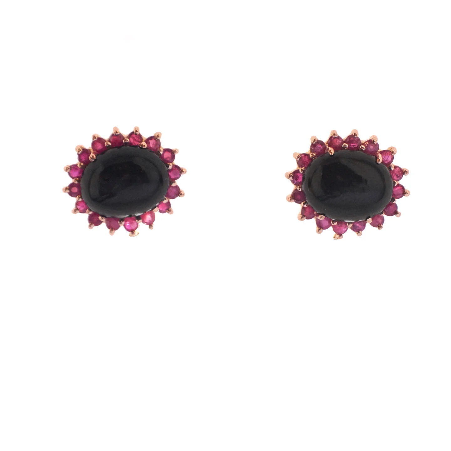  Martha Studs   $8,900.00      A pair of charming earstuds, set in eighteen-karat rose gold.  The main gemstone is a cabochon ovular back star diopside, framed with a collection of round rubies.        This piece, in its entirety, has been created an