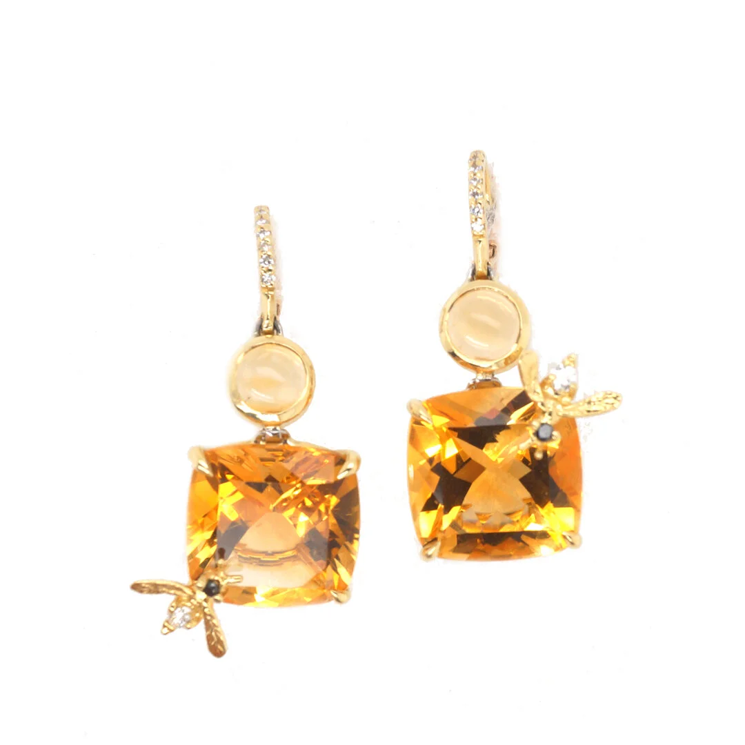  Citrine Bee Earrings   $11,500.00       A pair of cushion-cut citrine earrings, set in eighteen-karat yellow gold.  A bumblebee, set with a single black diamond and a single white diamond, has been whimsically placed on each earring.     This piece,