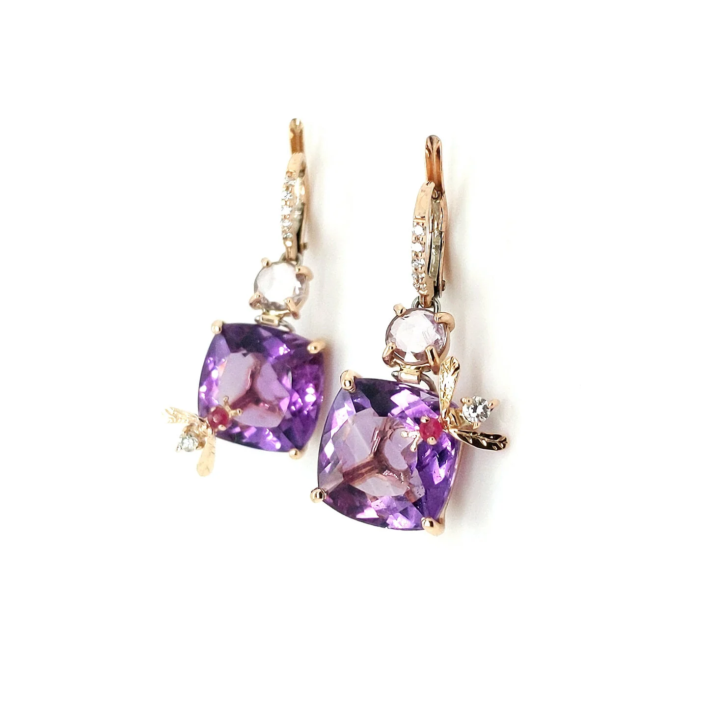  Amethyst and Pink Sapphire Bee Earrings   $11,400.00      A pair of faceted cushion-cut amethyst and pink sapphire earrings, set in eighteen-karat rose gold.  A bumblebee, set with a round facetted ruby and a round faceted white diamond, has been wh