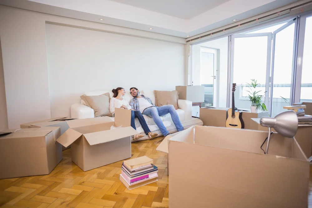 A couple discussing what to move first during the moving process