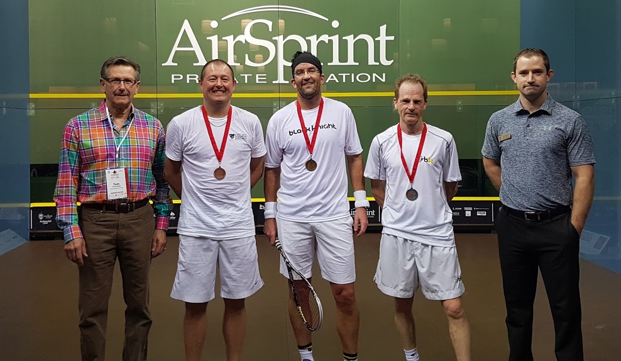 Men's 50+ Podium: Ontario winner David Sly (middle) with Ontario finalist Willie Hosey (second from right)