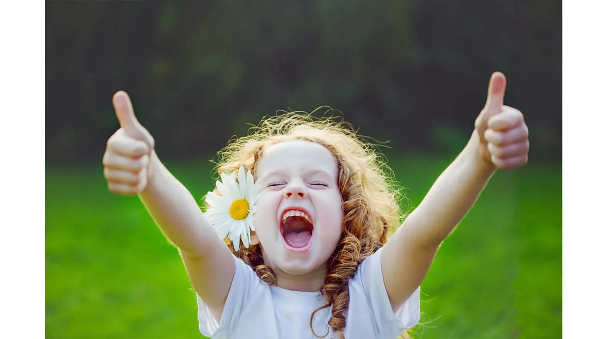 Child in Joy with 2 Thumbs Up.jpg
