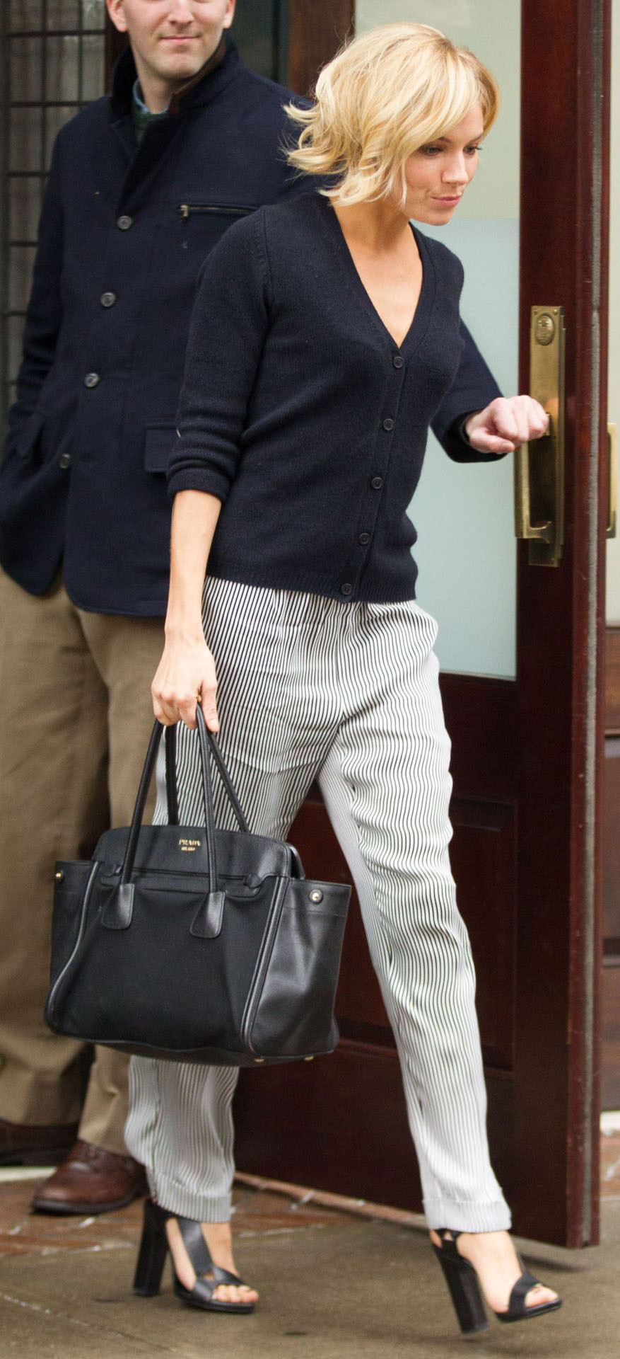 grayl-joggers-pants-stripe-black-cardigan-black-bag-black-shoe-sandalh-siennamiller-spring-summer-blonde-work.jpg