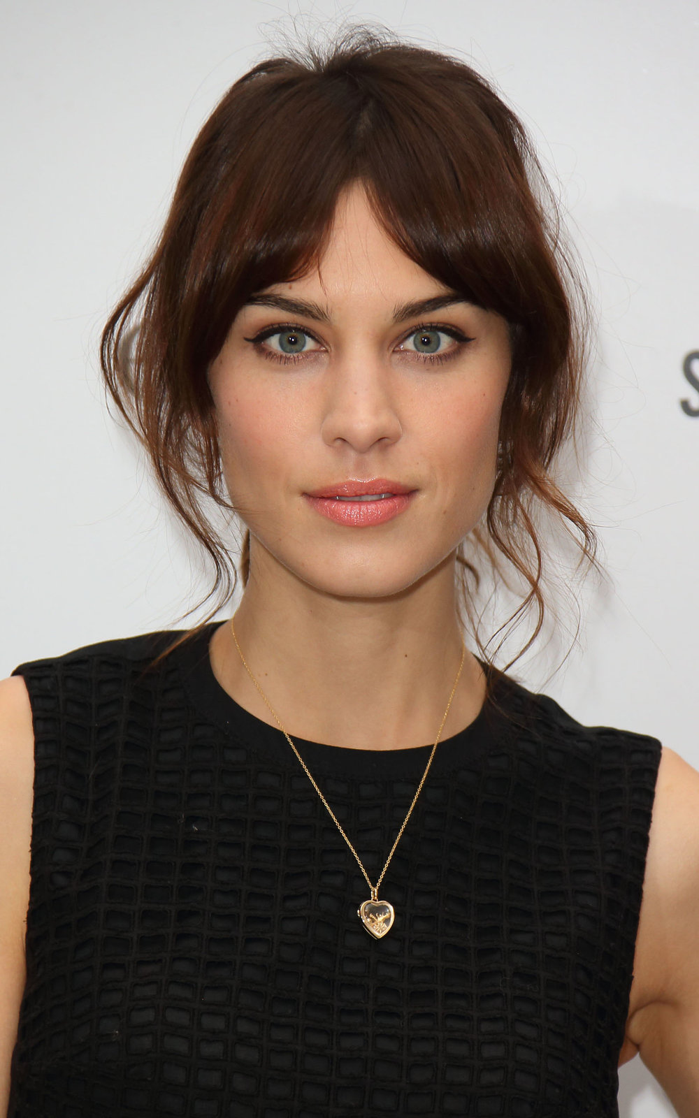 what-to-wear-oblong-face-shape-style-haircut-sunglasses-hat-earrings-jewelry-alexachung-updo-messy-bangs-black.jpg