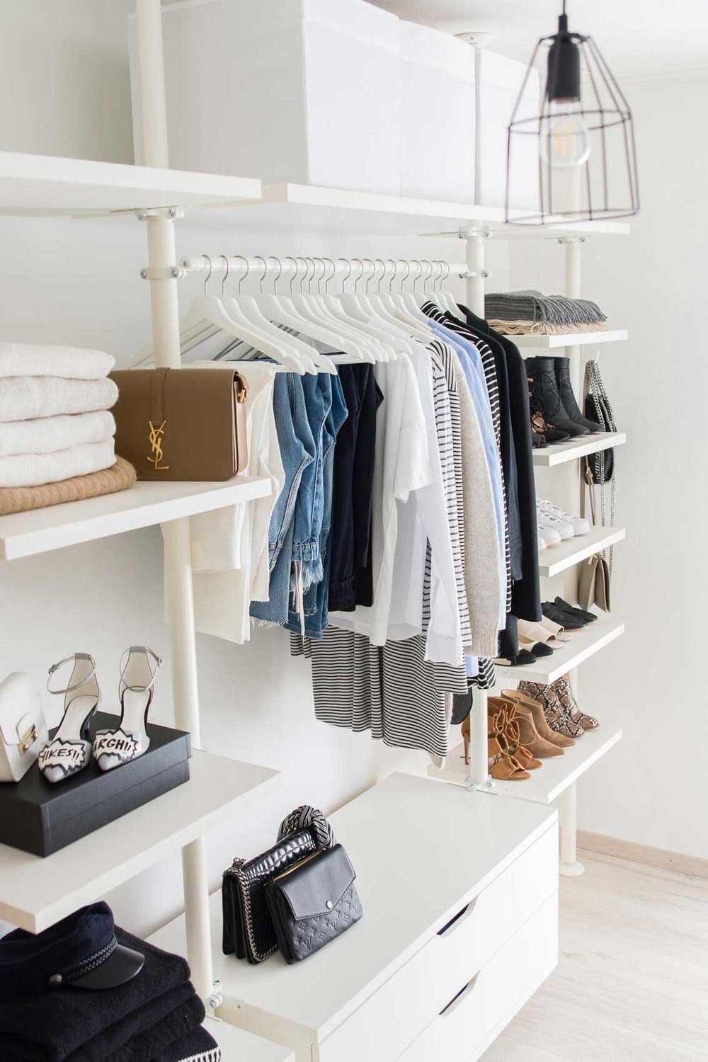how-to-organize-your-clothes-wardrobe-storage-shelves-handbags-shoes-folded-cleanout-closet-system-white.jpg
