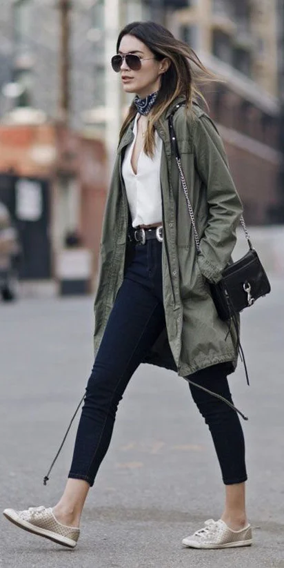 green jacket with blue jeans