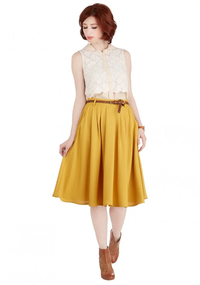 yellow skirt and white top