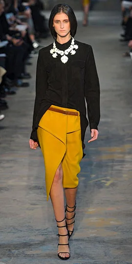 yellow top with black skirt
