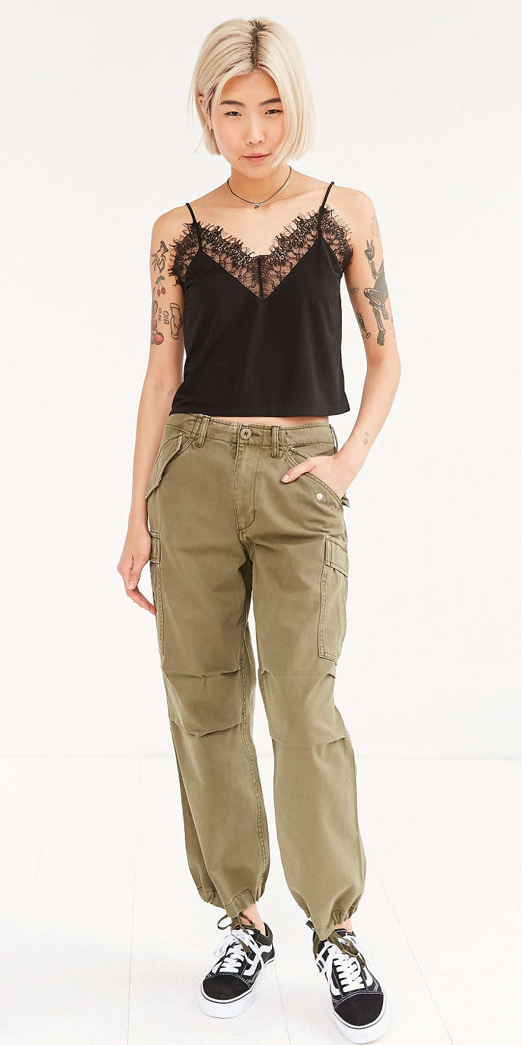 green pants with black shoes