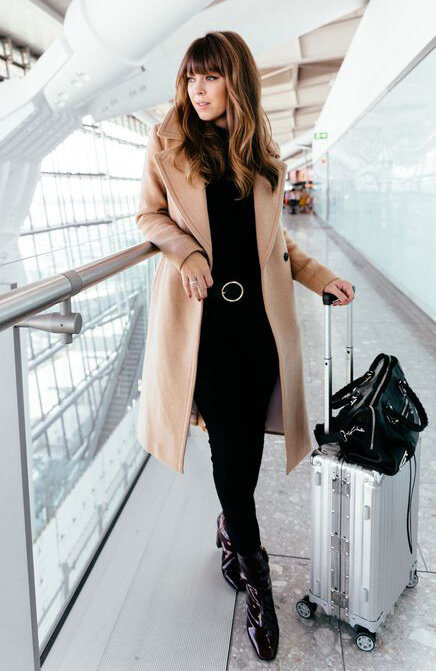 02-all-black-look-with-jeans-a-top-boots-and-a-camel-coat-for-a-modern-and-comfy-look.jpg