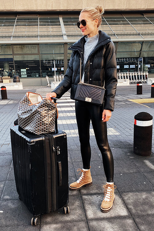 Fashion-Jackson-Wearing-Black-Puffer-Coat-Black-Leggings-Winter-Boots-Calpak-Luggage-Airport-Outfit-Iceland-Itinerary-Travel-Guide.jpg