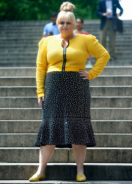 black-midi-skirt-print-yellow-cardigan-yellow-shoe-loafers-bun-rebelwilson-blonde-fall-winter-lunch.jpg