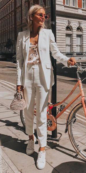 white-slim-pants-suit-pink-light-cami-polkadot-print-white-jacket-blazer-blonde-sun-white-shoe-sneakers-spring-summer-lunch.jpg