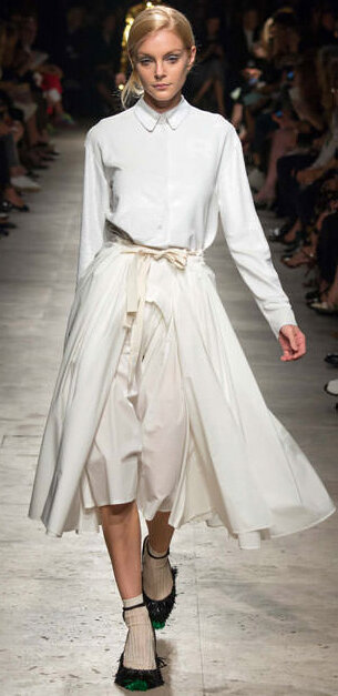 white-midi-skirt-white-top-blouse-socks-black-shoe-pumps-bun-wear-outfit-spring-summer-runway-blonde-work.jpg