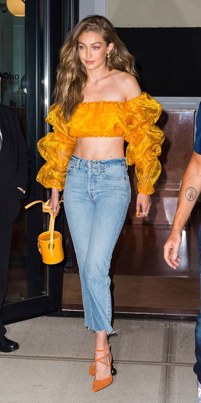 blue-light-crop-jeans-yellow-crop-top-offshoulder-blonde-earrings-yellow-bag-yellow-shoe-pumps-gigihadid-spring-summer-dinner.jpg