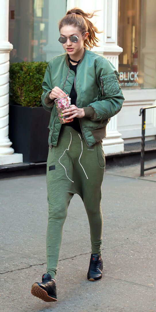 green-olive-joggers-pants-black-tee-blonde-sun-pony-gigihadid-black-shoe-sneakers-green-olive-jacket-bomber-fall-winter-weekend.jpg