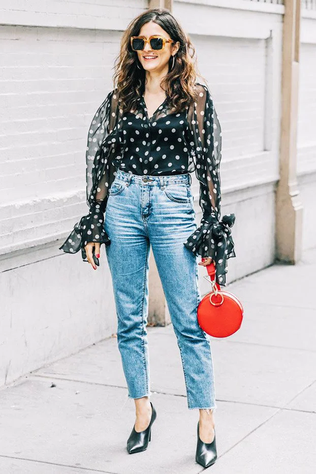 red blouse with black polka dots