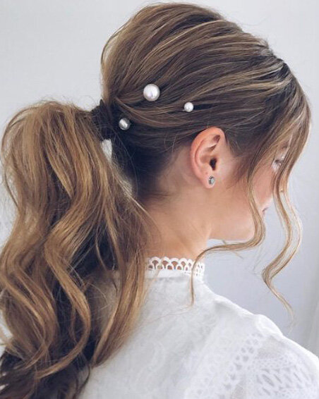 The Ultimate Guide to Low Ponytails | HOWTOWEAR Fashion